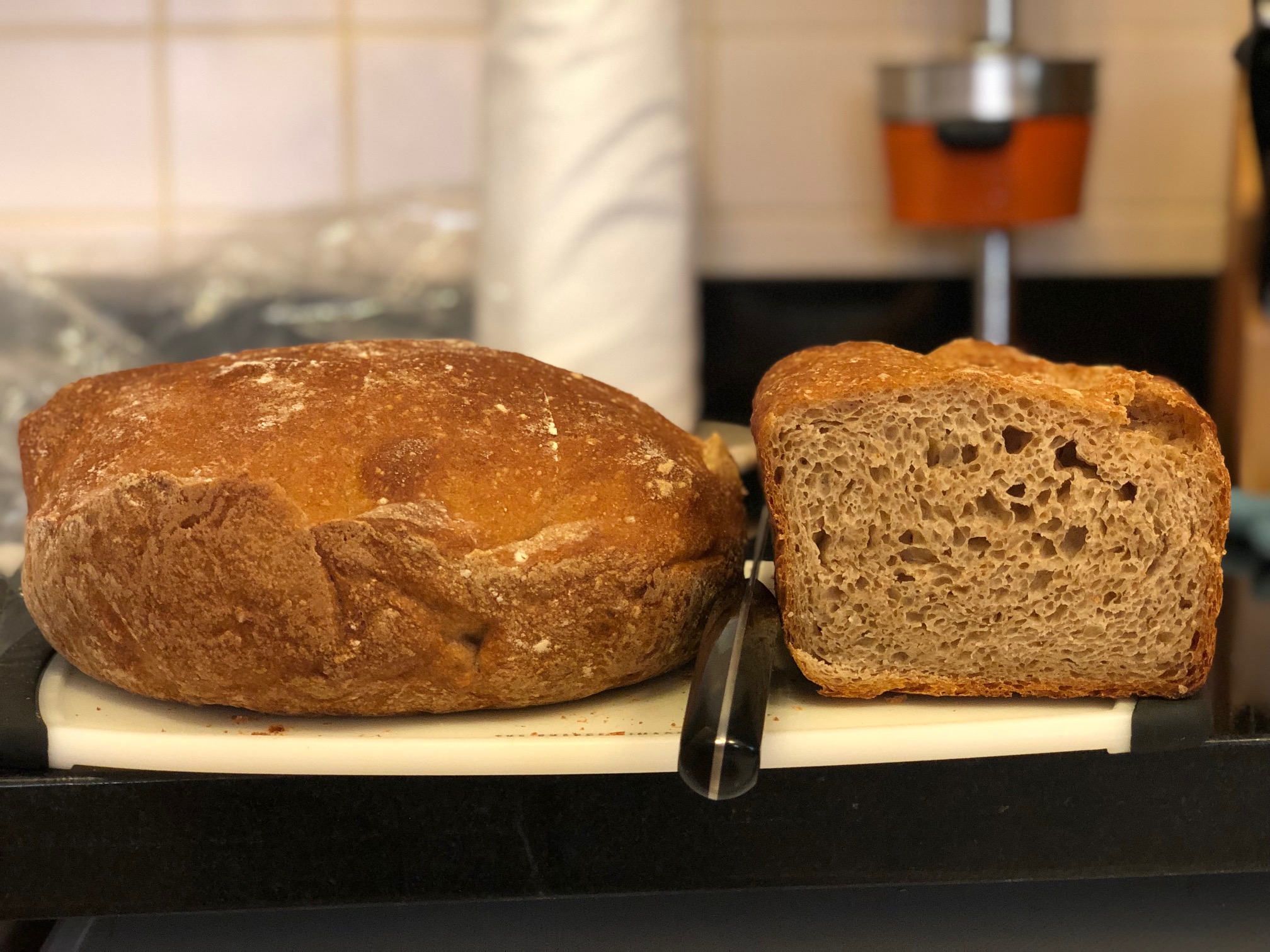 The dutch oven loaf rose better. Denser crumb on the bottom.