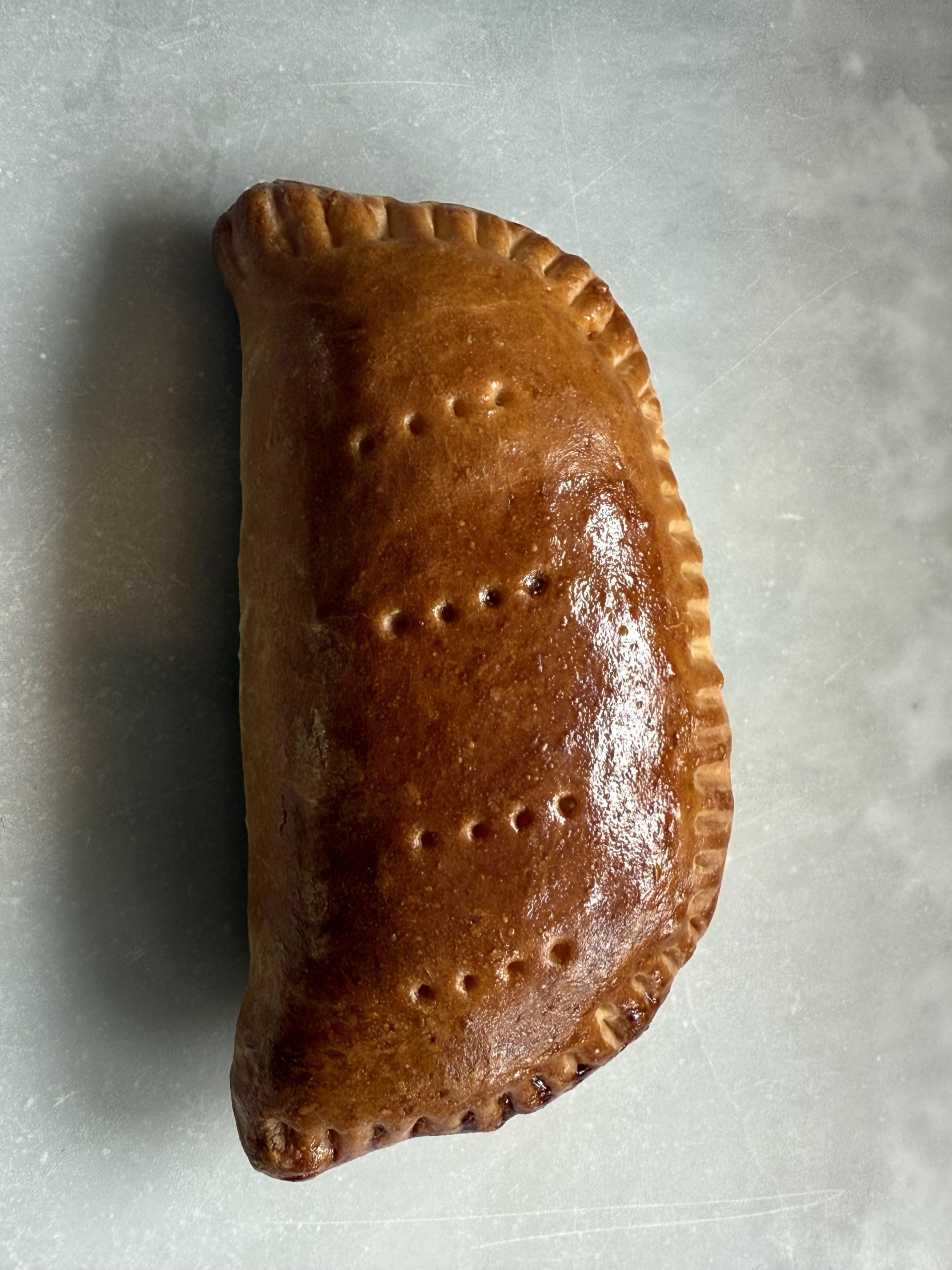 a pizza pocket on a marble counter