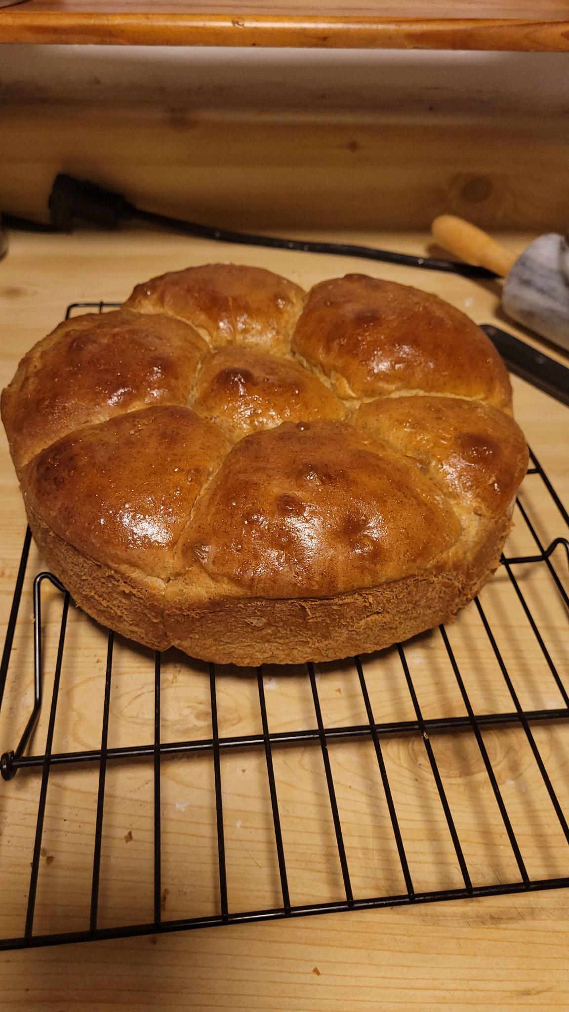 7 Pumpkin buns on a cooling rack