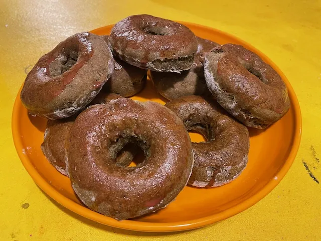 a plate of vegan whole wheat donuts